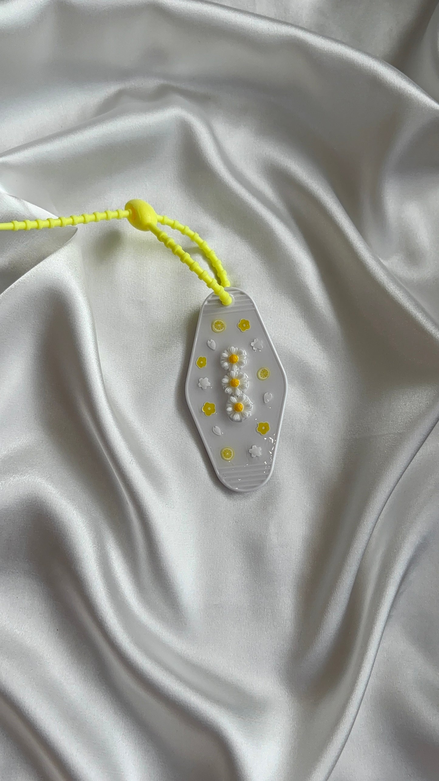 Porte-clés grigri BLOOM