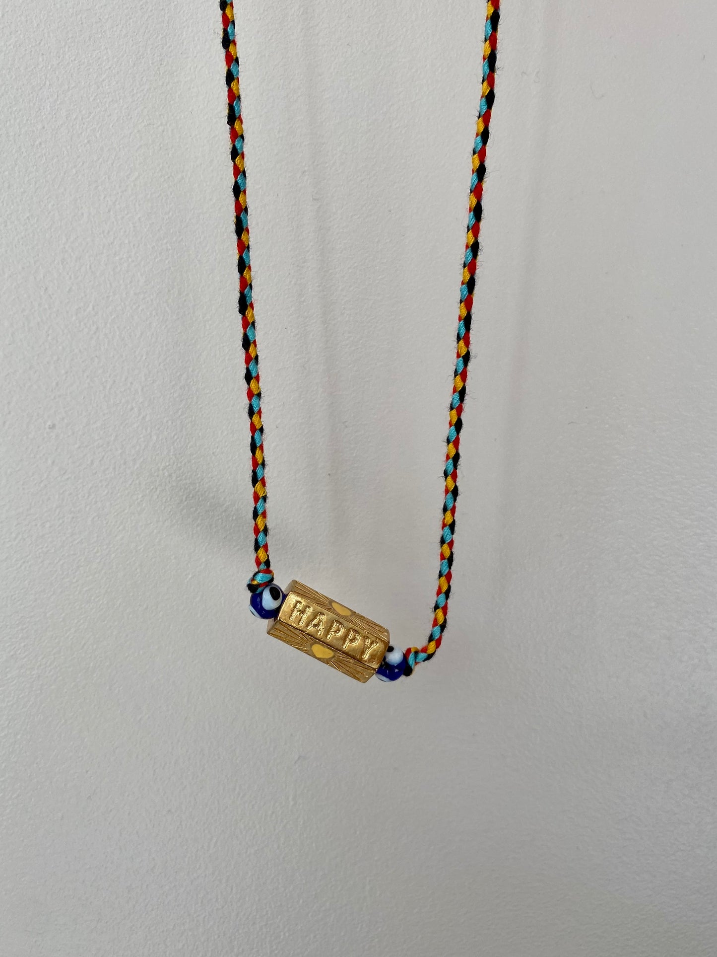 Collier cordon amulette