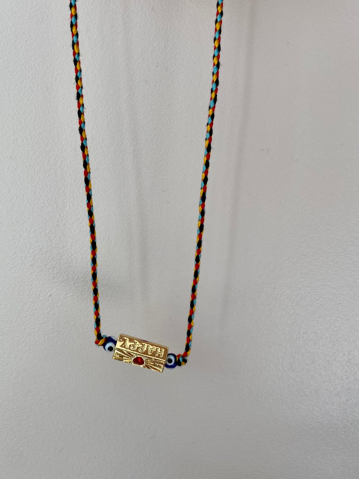 Collier cordon amulette