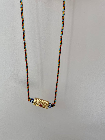 Collier cordon amulette