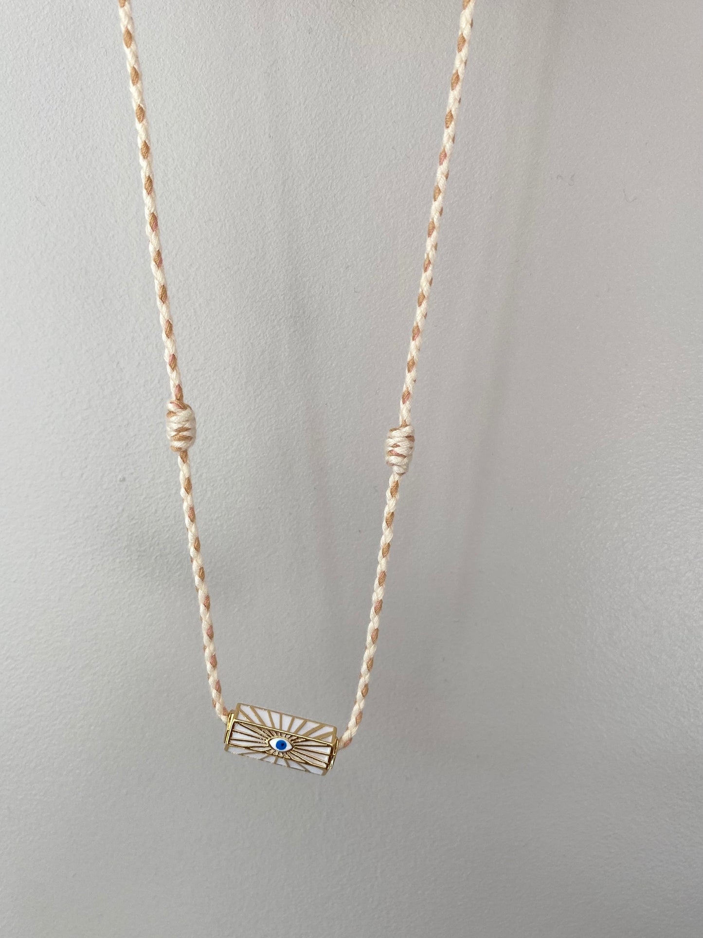 Collier cordon amulette